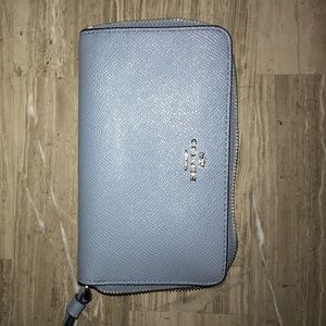 Authentic Coach wristlet/phone holder. New